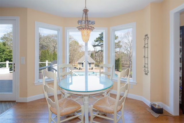 115 Highland Rd, Southampton, NY 11968 - dining space with wood finished floors and baseboards