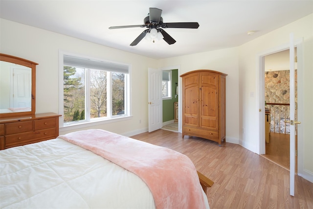 115 Highland Rd, Southampton, NY 11968 - bedroom featuring light wood-style flooring and a ceiling fan