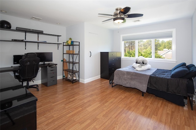 115 Highland Rd, Southampton, NY 11968 - bedroom with light wood-style flooring and an office area