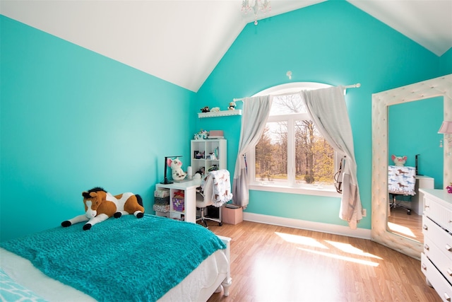 115 Highland Rd, Southampton, NY 11968 - bedroom featuring lofted ceiling and wood finished floors