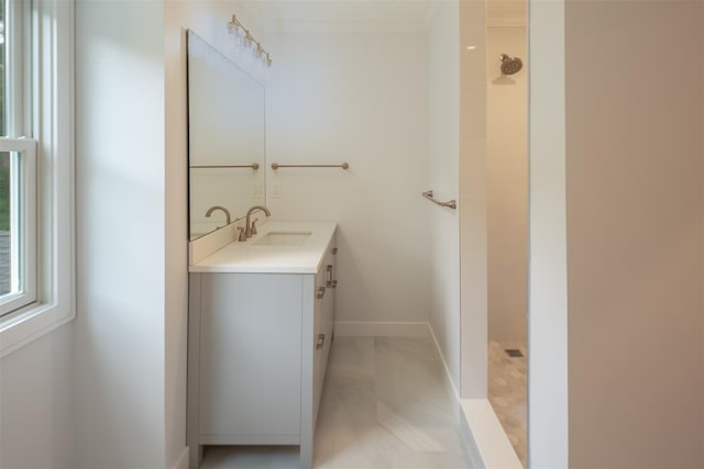 20 Oak Grove Rd, Southampton, NY 11968 - full bath featuring vanity, a tile shower, ornamental molding, and marble finish floors