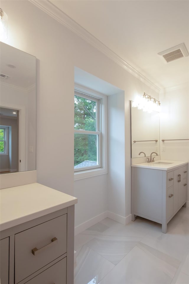 20 Oak Grove Rd, Southampton, NY 11968 - bathroom featuring vanity, ornamental molding, and plenty of natural light