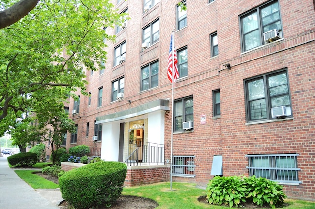 84-31 Van Wyck Expy Unit 5F, Briarwood, NY 11435 - view of apartment building / complex featuring cooling unit