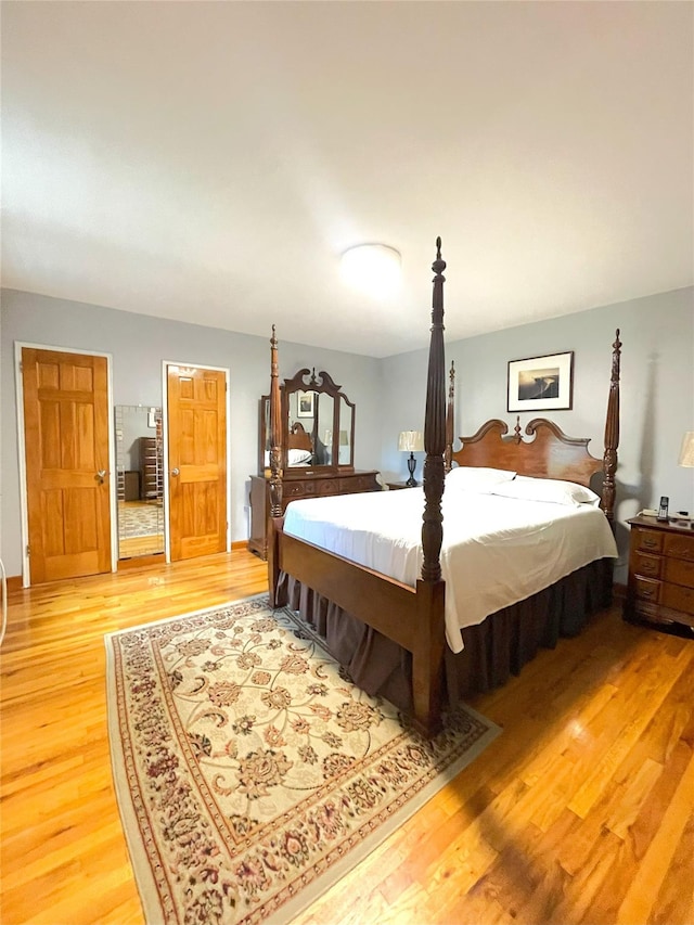 84-31 Van Wyck Expy Unit 5F, Briarwood, NY 11435 - bedroom with light wood finished floors