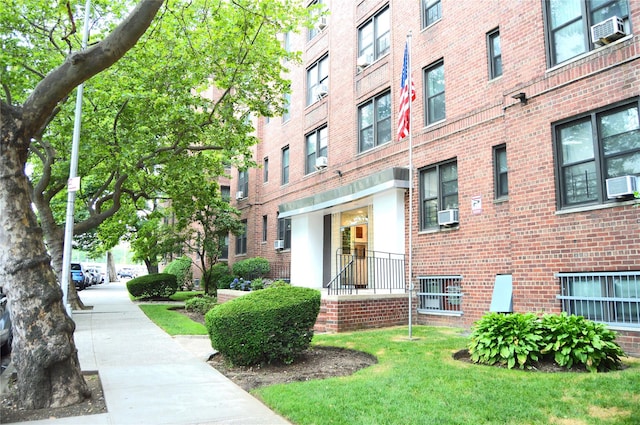 84-31 Van Wyck Expy Unit 5F, Briarwood, NY 11435 - view of building exterior featuring cooling unit