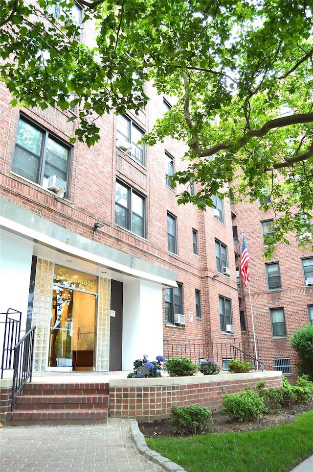 84-31 Van Wyck Expy Unit 5F, Briarwood, NY 11435 - view of apartment building / complex featuring cooling unit