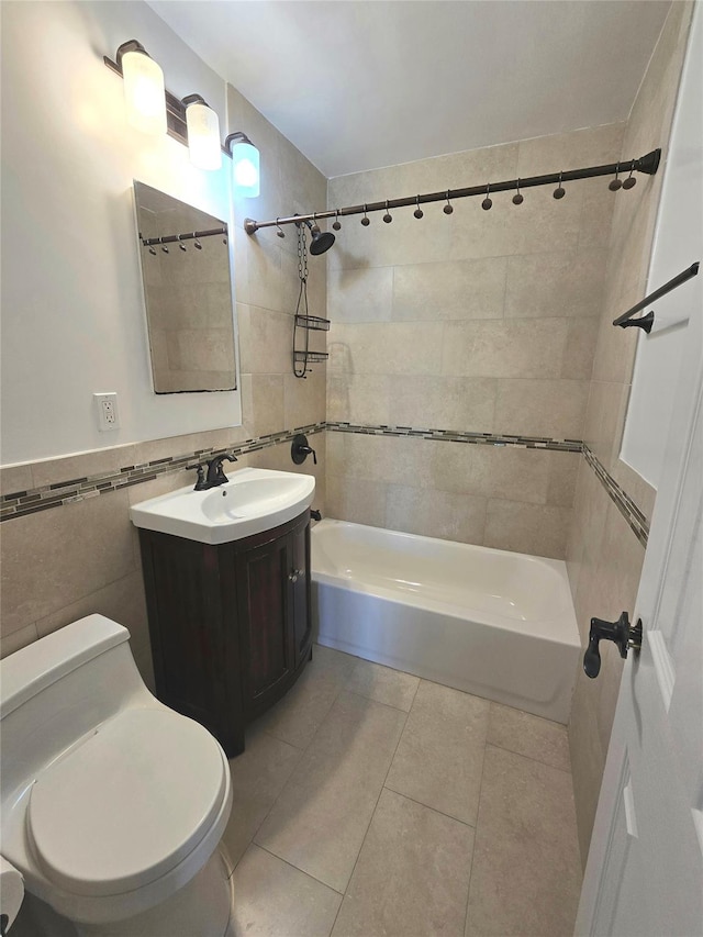 151-35 84th St Unit 1C, Howard Beach, NY 11414 - bathroom featuring bathtub / shower combination, tile walls, vanity, and tile patterned flooring