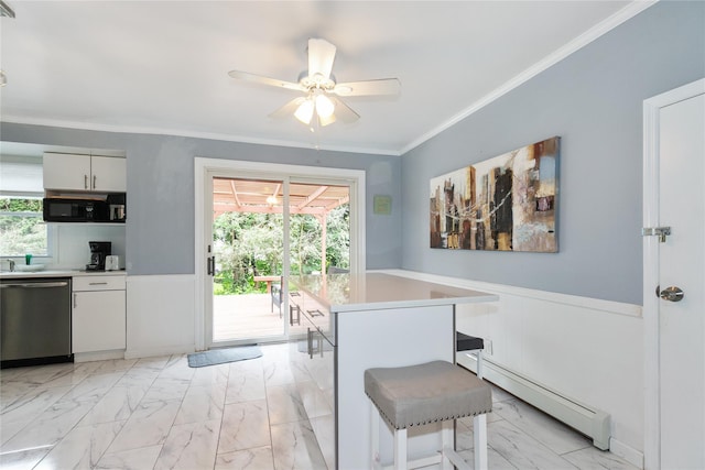 11 Glenwood Rd, Glen Head, NY 11545 - dining space featuring a baseboard heating unit, light marble finish floors, wainscoting, a ceiling fan, and crown molding