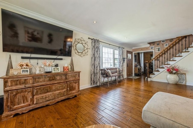 369 S 16th St, Lindenhurst, NY 11757 - living room with stairs, hardwood / wood-style flooring, and crown molding