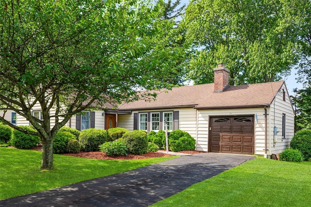 16 Ria Dr, White Plains, NY 10605 - view of front of home featuring an attached garage, asphalt driveway, a front lawn, a chimney, and roof with shingles