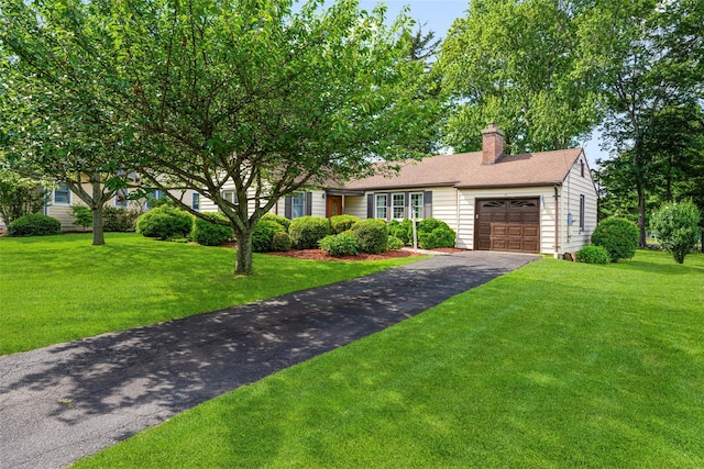 16 Ria Dr, White Plains, NY 10605 - view of front of property featuring an attached garage, asphalt driveway, a chimney, and a front lawn