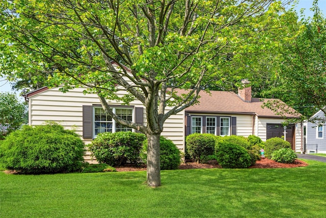 16 Ria Dr, White Plains, NY 10605 - view of front of property featuring a front lawn, an attached garage, and a chimney
