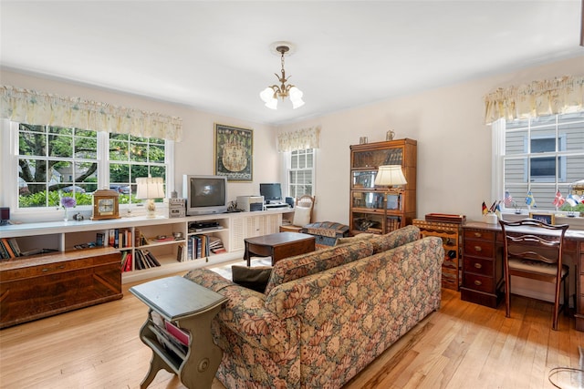 16 Ria Dr, White Plains, NY 10605 - living room featuring an office area, a chandelier, and wood-type flooring