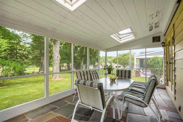 16 Ria Dr, White Plains, NY 10605 - sunroom featuring a skylight, vaulted ceiling, and outdoor dining area