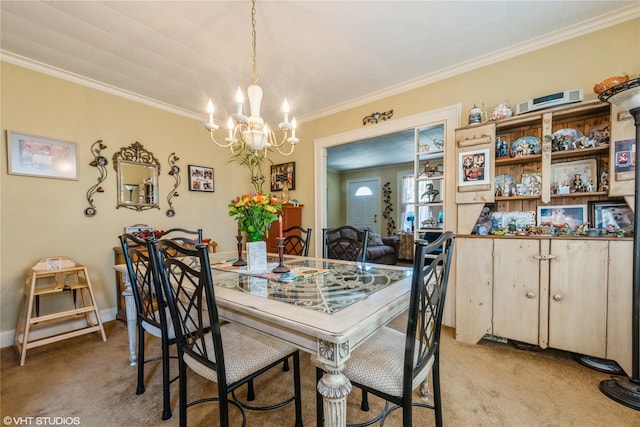 232 Broad St, Williston Park, NY 11596 - dining area with light colored carpet, a chandelier, and ornamental molding