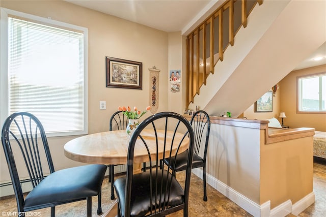 232 Broad St, Williston Park, NY 11596 - dining room with baseboards and a baseboard radiator