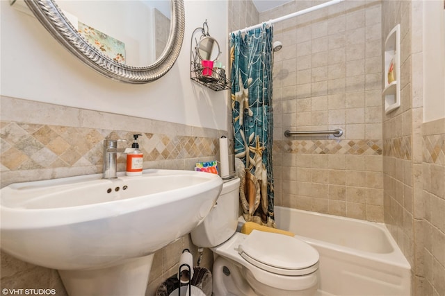 232 Broad St, Williston Park, NY 11596 - full bath with tile walls, shower / bathtub combination with curtain, and wainscoting