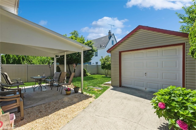 232 Broad St, Williston Park, NY 11596 - detached garage featuring asphalt driveway