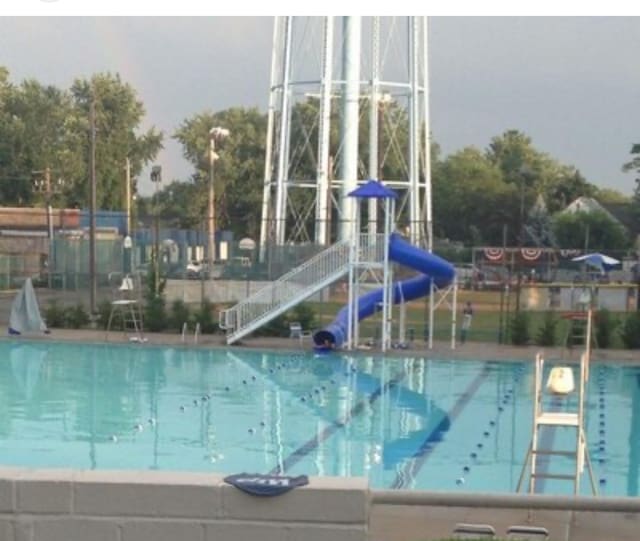232 Broad St, Williston Park, NY 11596 - community pool with a water slide