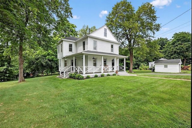 39 Frost Ln, Cornwall, NY 12518 - farmhouse inspired home with a porch, a front lawn, board and batten siding, and view of scattered trees