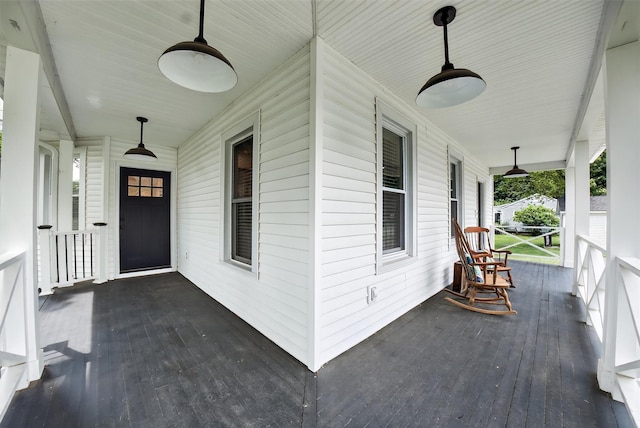 39 Frost Ln, Cornwall, NY 12518 - property entrance with a porch and a ceiling fan