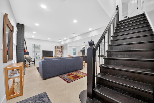39 Frost Ln, Cornwall, NY 12518 - living area featuring stairs, light wood-style floors, and recessed lighting