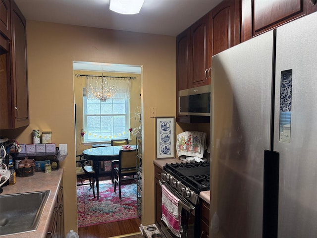 600 Commons Way Unit A, Fishkill, NY 12524 - kitchen featuring stainless steel appliances, a chandelier, and light countertops