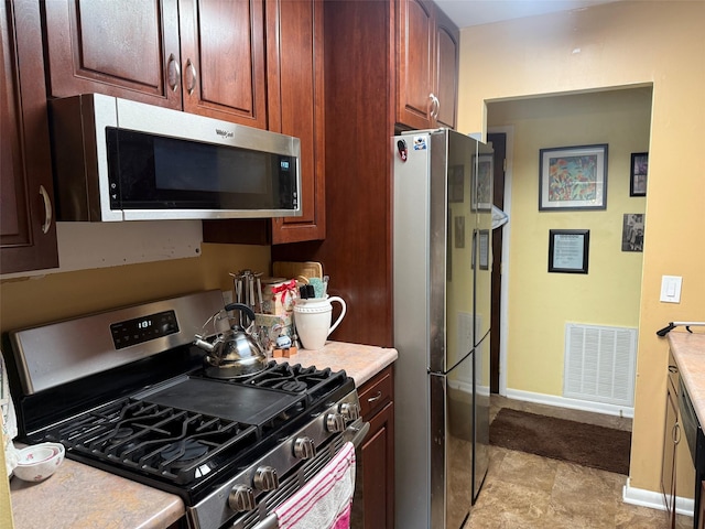600 Commons Way Unit A, Fishkill, NY 12524 - kitchen featuring appliances with stainless steel finishes and light countertops