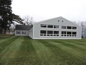 600 Commons Way Unit A, Fishkill, NY 12524 - rear view of house featuring a yard