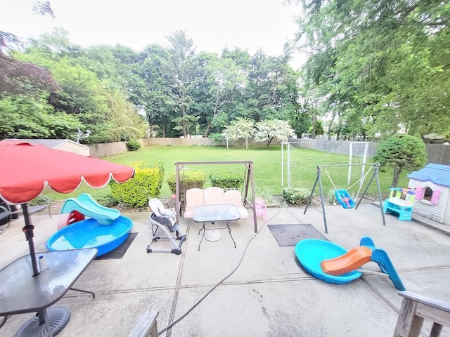 22 Prospect Ave, Brentwood, NY 11717 - fenced backyard featuring a patio area