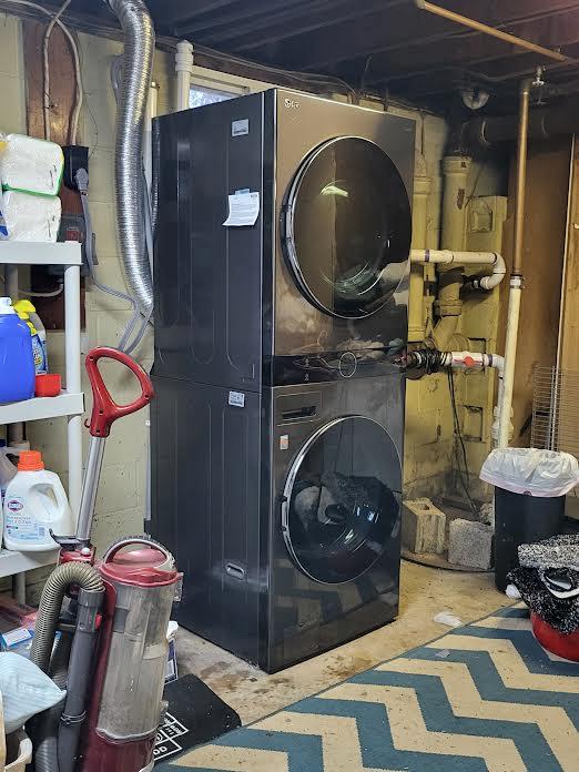 22 Prospect Ave, Brentwood, NY 11717 - laundry area with stacked washing machine and dryer