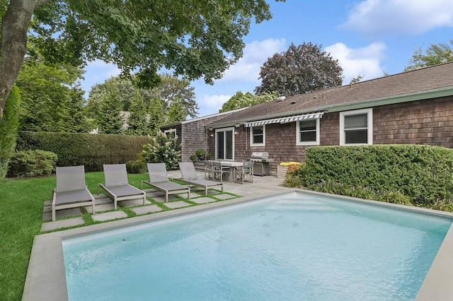20 Stratton Sq, East Hampton, NY 11937 - view of swimming pool with grilling area and a patio area