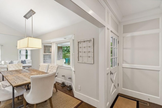 20 Stratton Sq, East Hampton, NY 11937 - dining space featuring vaulted ceiling and wood finished floors