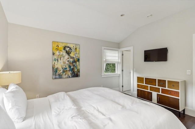 20 Stratton Sq, East Hampton, NY 11937 - bedroom with lofted ceiling and wood finished floors