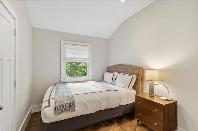 20 Stratton Sq, East Hampton, NY 11937 - bedroom with lofted ceiling and wood finished floors