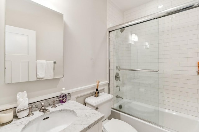 20 Stratton Sq, East Hampton, NY 11937 - bathroom featuring vanity and bath / shower combo with glass door