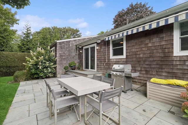 20 Stratton Sq, East Hampton, NY 11937 - view of patio / terrace with grilling area and outdoor dining area