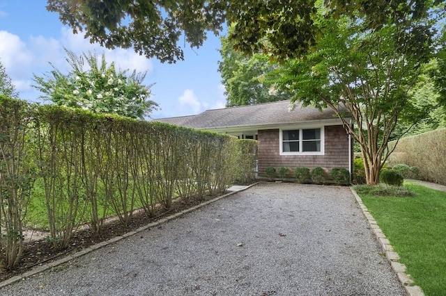 20 Stratton Sq, East Hampton, NY 11937 - view of patio with driveway