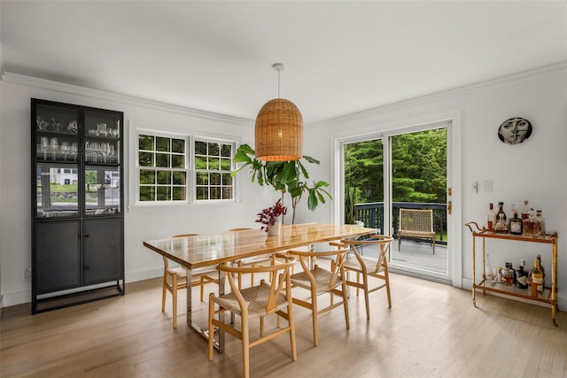 920 Protano Ln, Mamaroneck, NY 10543 - dining space featuring crown molding and light wood-type flooring