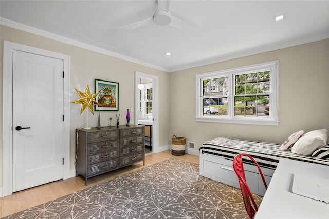 920 Protano Ln, Mamaroneck, NY 10543 - bedroom featuring wood finished floors, crown molding, recessed lighting, ceiling fan, and connected bathroom
