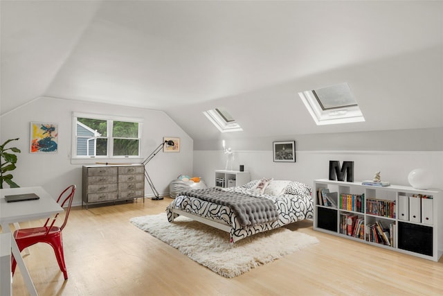 920 Protano Ln, Mamaroneck, NY 10543 - bedroom with a skylight, wood finished floors, and lofted ceiling