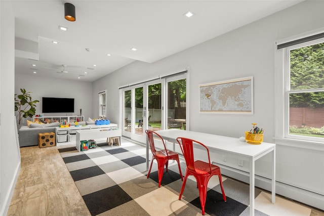 920 Protano Ln, Mamaroneck, NY 10543 - dining room with healthy amount of natural light, french doors, recessed lighting, and a baseboard heating unit