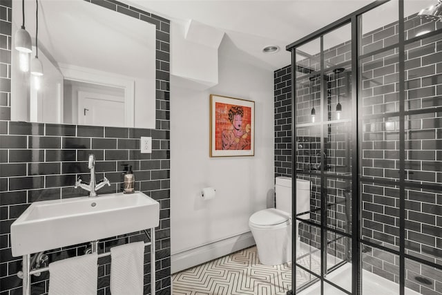 920 Protano Ln, Mamaroneck, NY 10543 - bathroom featuring a shower stall, tile walls, and a baseboard radiator
