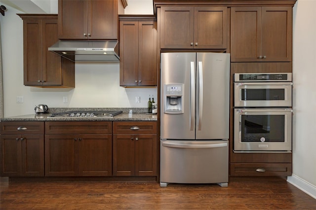 44 Linwood Dr, Wappingers Falls, NY 12590 - kitchen with appliances with stainless steel finishes, range hood, dark wood-style floors, and dark stone counters