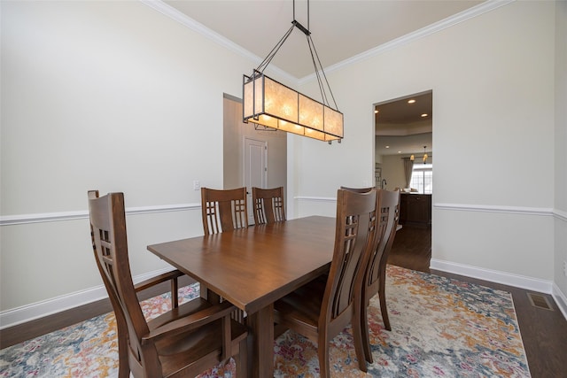 44 Linwood Dr, Wappingers Falls, NY 12590 - dining area with wood finished floors and crown molding