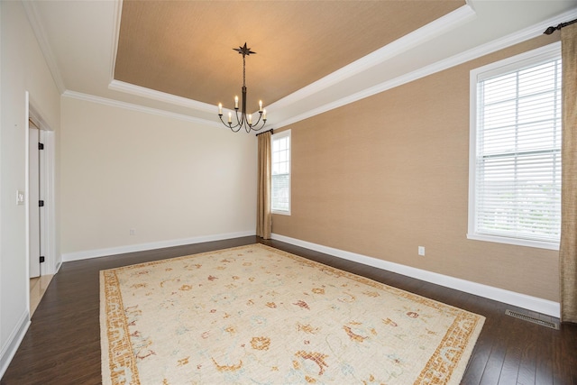 44 Linwood Dr, Wappingers Falls, NY 12590 - empty room with a raised ceiling, healthy amount of natural light, dark wood finished floors, and crown molding