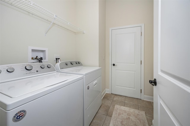 44 Linwood Dr, Wappingers Falls, NY 12590 - laundry area with washer and clothes dryer and light tile patterned flooring