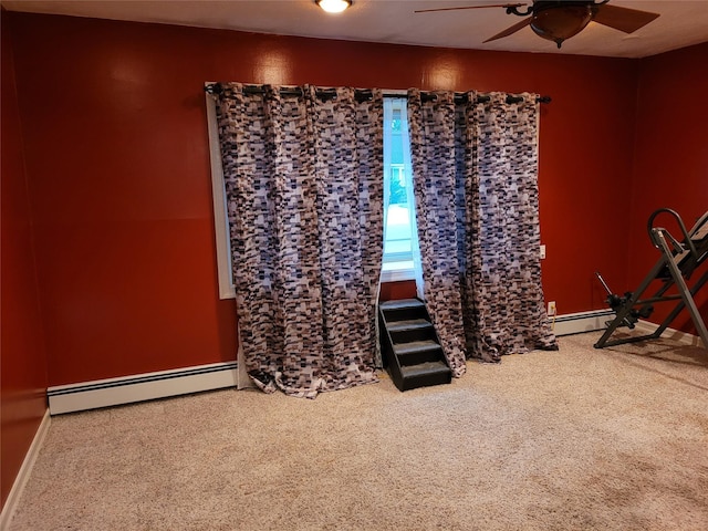 25 Herman Ave, North Babylon, NY 11703 - exercise room with a baseboard radiator, carpet flooring, and ceiling fan