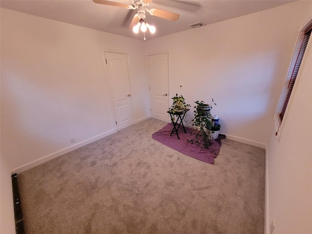 25 Herman Ave, North Babylon, NY 11703 - empty room with carpet flooring and ceiling fan