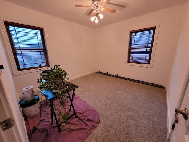 25 Herman Ave, North Babylon, NY 11703 - carpeted spare room featuring a ceiling fan and baseboards